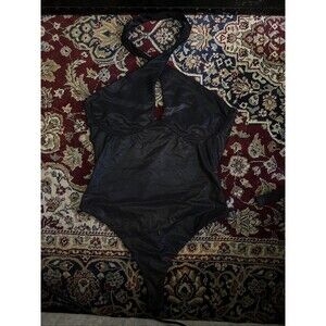 Black Shiny Body Suit Size Medium. Low Back With Cross Neck.